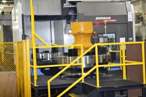 Pallet changer, flexible manufacturing system